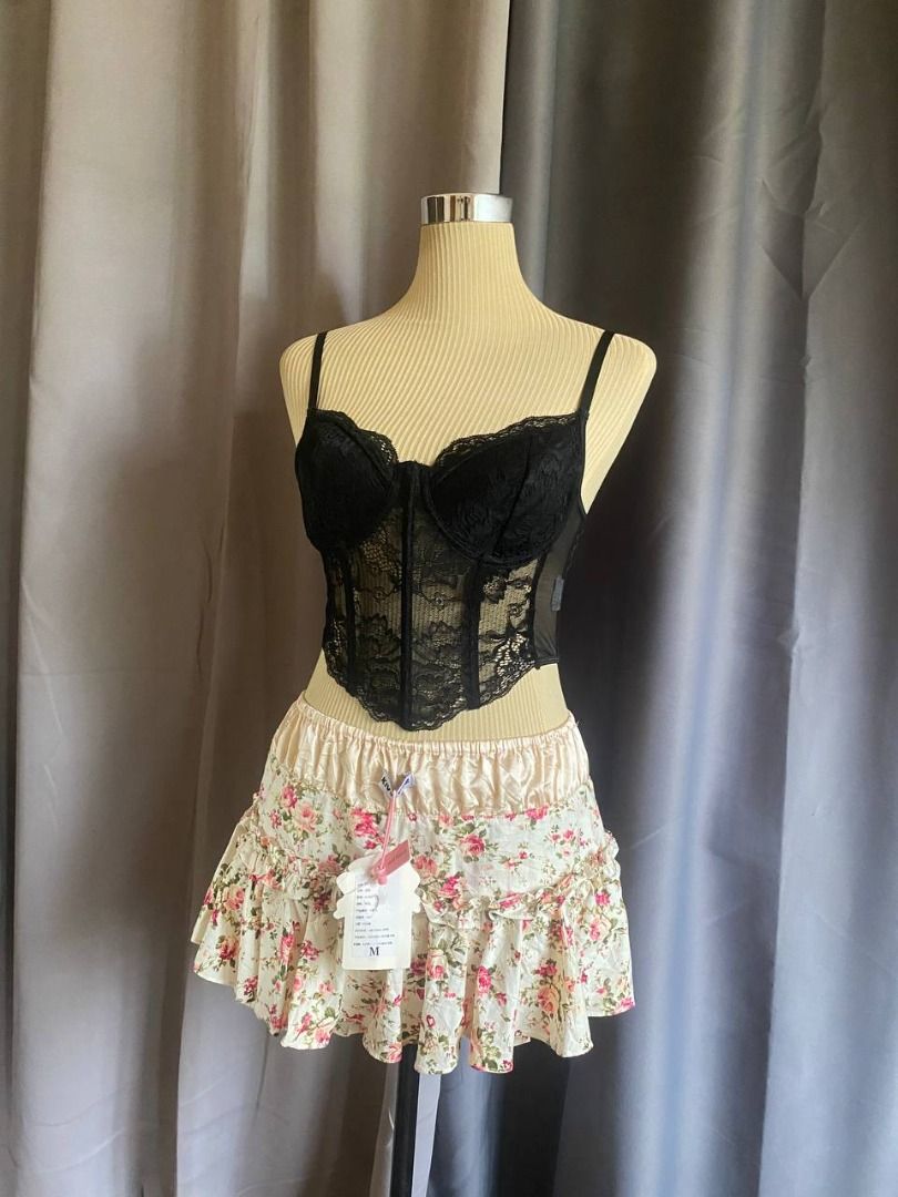Black Lace Corset Top (Category: Sleeveless) located in Cagayan de Oro. Submitted by curated_closetph (Listing ID 1469288877, Image 2). Description: — Size: XS - S — Color: Black — Sheer floral lace and mesh panels — Adjustable cami shoulder straps — Underwire cups — Pointed asymmetrical hem — Smooth stretch knit back — Can negotiate the price — 🛒 Shop more to get more discounts and freebies!.