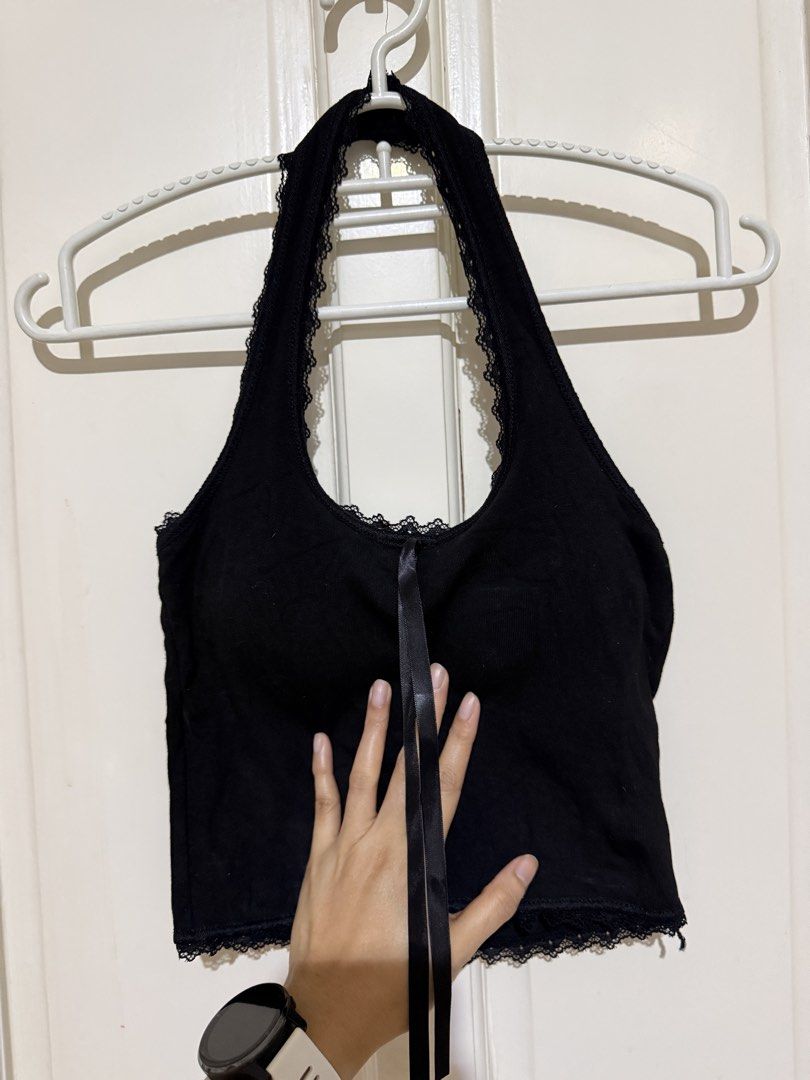 Black lace trim halter top (Category: Sleeveless) located in Marikina City. Submitted by louvy.r (Listing ID 1469377321, Image 1). Description: Fits small body frame Padded.