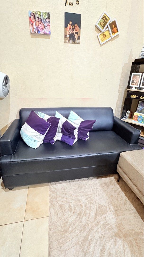 Black Leather Sofa (Throw Pillows not included) (Category: Sofas) located in Pasig City. Submitted by prettyoldsoul (Listing ID 1469177074, Image 2). Description: - Type: 3-Seater Sofa - Material: Easy-to-maintain black faux leather - Condition: good as new, Clean, well-kept - Features: Sturdy armrests on both sides - Best for: Living room or office space.
