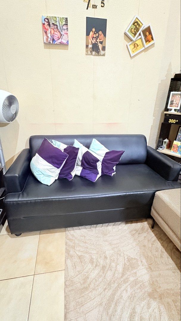 Black Leather Sofa (Throw Pillows not included) (Category: Sofas) located in Pasig City. Submitted by prettyoldsoul (Listing ID 1469177074, Image 1). Description: - Type: 3-Seater Sofa - Material: Easy-to-maintain black faux leather - Condition: good as new, Clean, well-kept - Features: Sturdy armrests on both sides - Best for: Living room or office space.