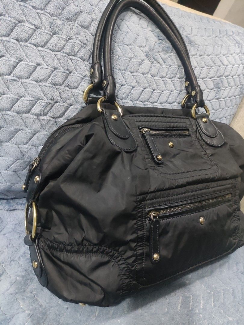 Tod's Black Nylon Bag (Category: Tote Bags) located in Cainta. Submitted by kluxurychoices (Listing ID 1469237878, Image 2). Description: Authentic Tod's Bag U.S bought very nice in actual .