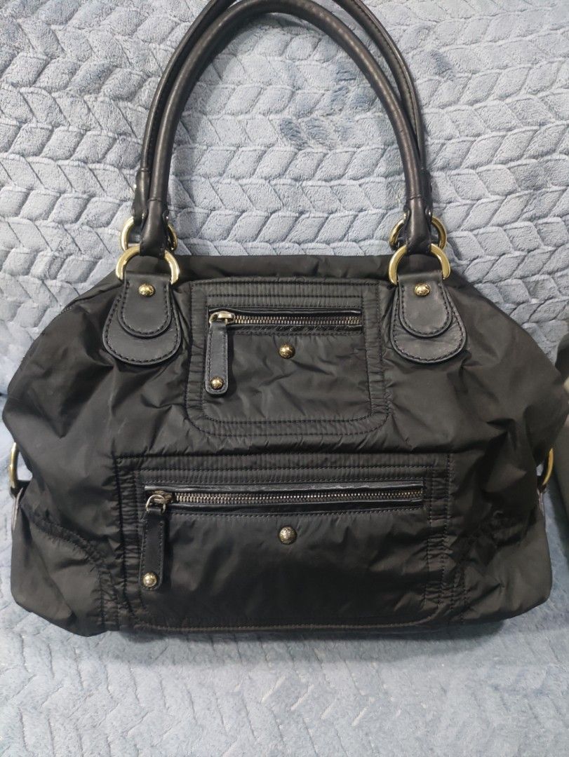 Tod's Black Nylon Bag (Category: Tote Bags) located in Cainta. Submitted by kluxurychoices (Listing ID 1469237878, Image 1). Description: Authentic Tod's Bag U.S bought very nice in actual .