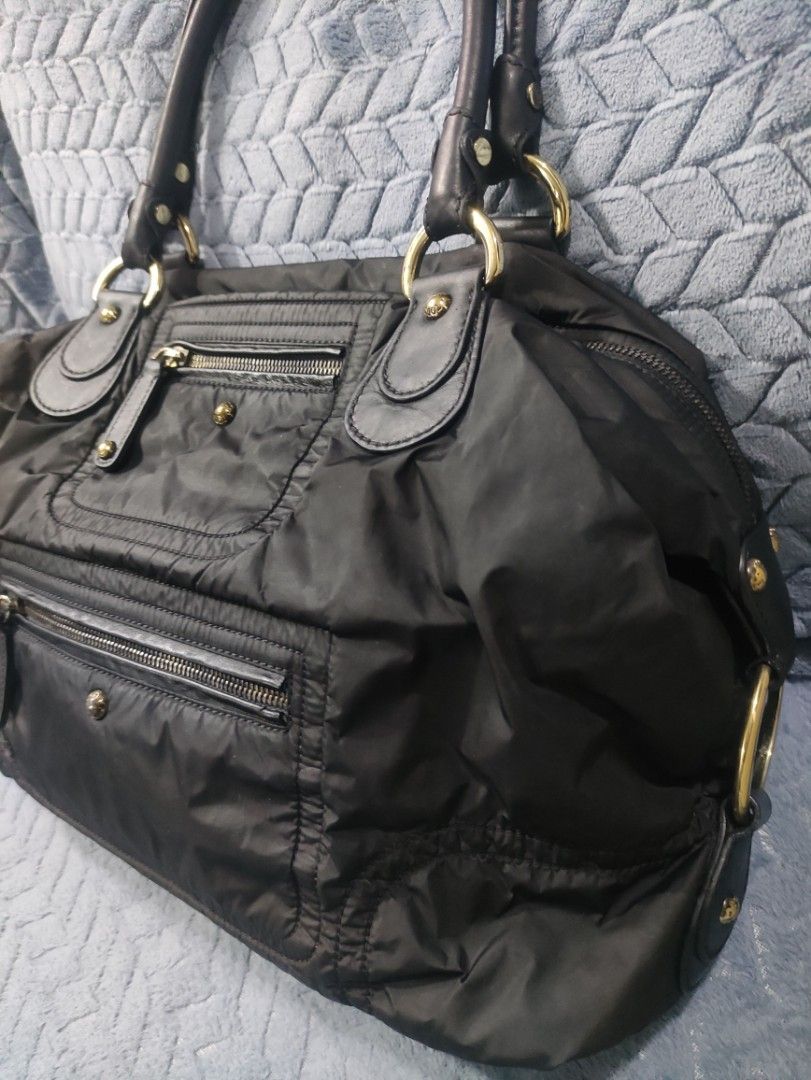 Tod's Black Nylon Bag (Category: Tote Bags) located in Cainta. Submitted by kluxurychoices (Listing ID 1469237878, Image 3). Description: Authentic Tod's Bag U.S bought very nice in actual .