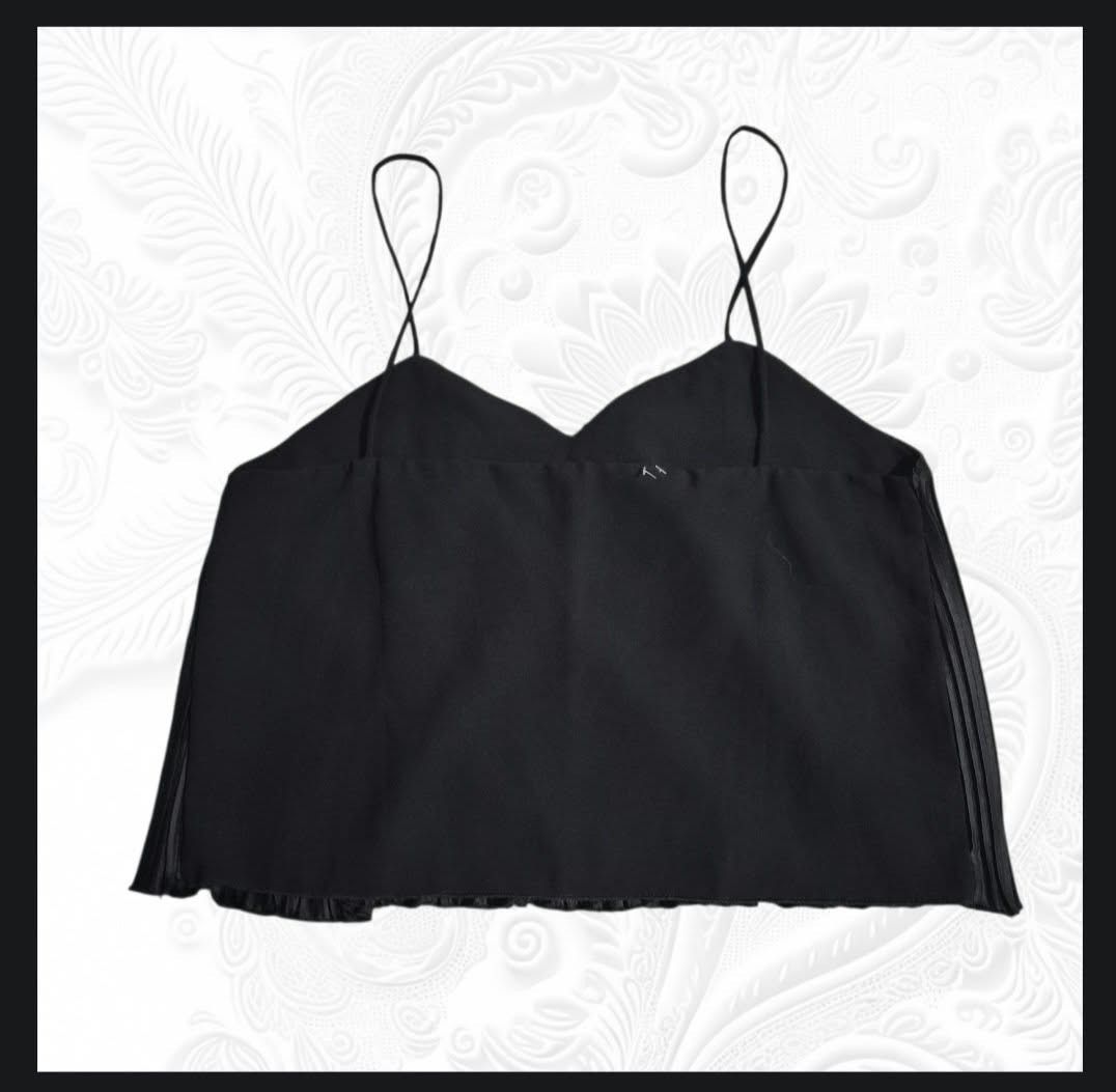 Black Pleated Camisole Spaghetti Strap Top (Category: Sleeveless) located in Paranaque City. Submitted by calm_youngstore7 (Listing ID 1469311355, Image 3). Description: LAST PIECE SALE! - Color: Black - Style: Pleated camisole with v-neckline, thin spaghetti straps, and a flowy layered drape - Size: Measures ~15 inches across the chest - Condition: Brand new, never worn - Extras: Original Nordstrom Rack tag still attached.