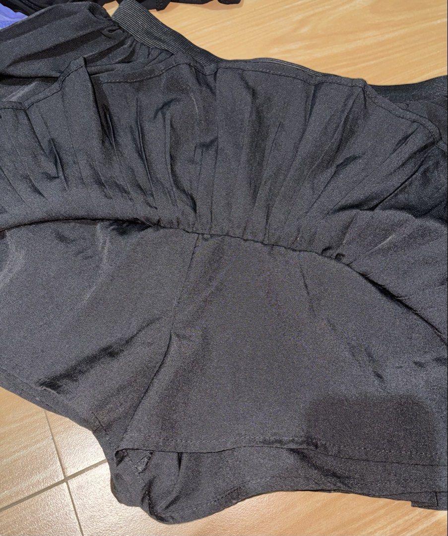 Black Pleated Layered Skort (Category: Skirts) located in Caloocan City. Submitted by stella_mari27 (Listing ID 1469227370, Image 2). Description: - Color: Black - Style: Pleated tiered skort - Comfort: Built-in shorts for worry-free wear - Waistband: Stretchy elastic for a comfortable fit - Fabric: Lightweight and easy to move in - Versatility: Great basic piece to match with simple tees or crop tops for casual days out.