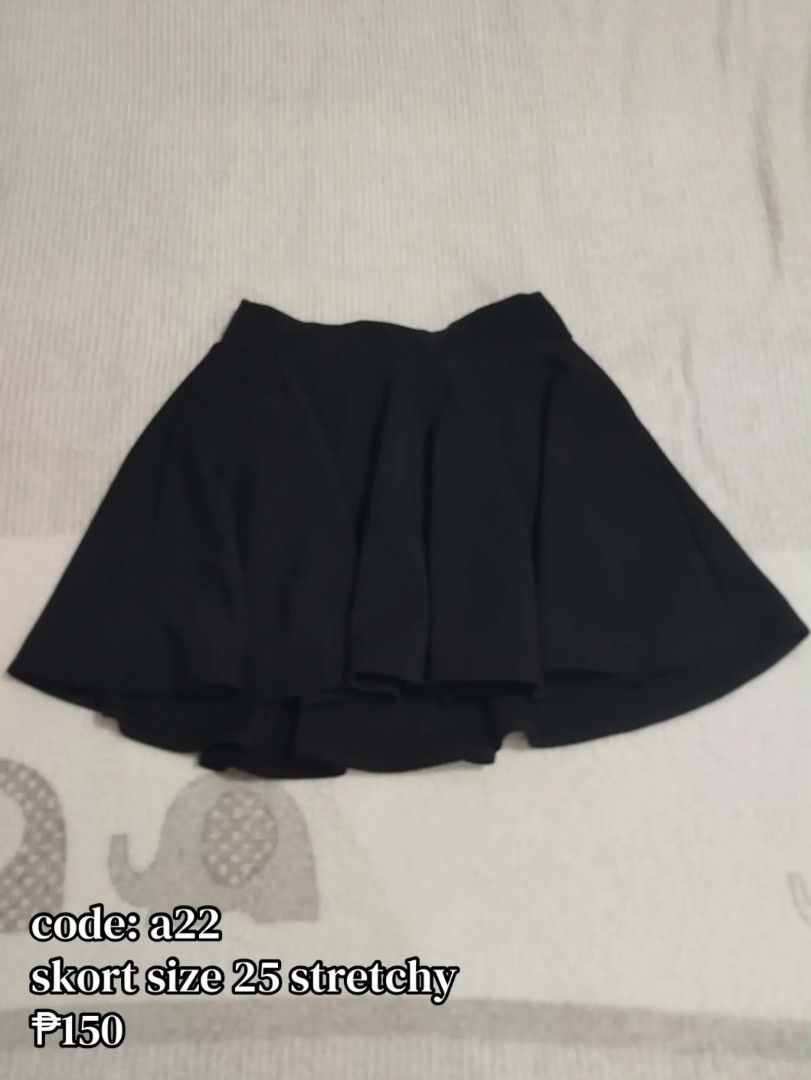 Black Skort Size 25 Stretchy Code a22 (Category: Skirts) located in Carmona. Submitted by ichorvault (Listing ID 1469285068, Image 1). Description: - Item: Black Skort (Code: A22) - Size: 25 - Material: Stretchy fabric for comfortable movement - Design: Flared skater style with built-in shorts underneath.