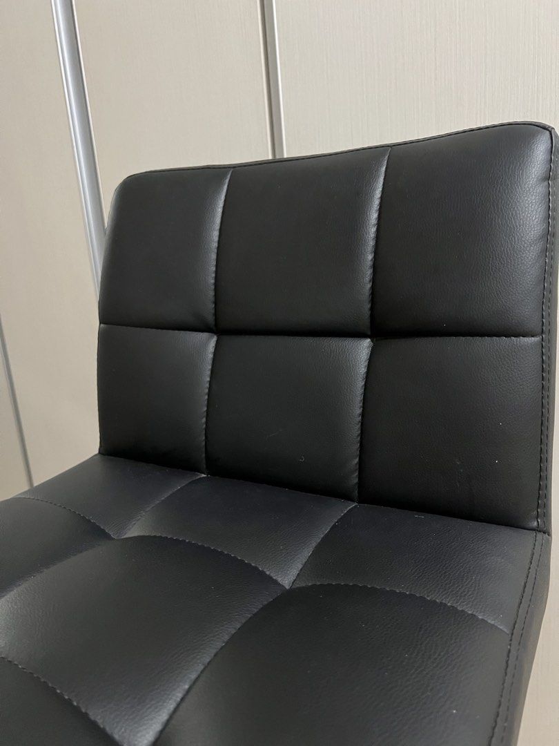 Black Tufted Faux Leather Adjustable Bar Stool (Category: Chairs) located in Cebu City. Submitted by myclothesdump12 (Listing ID 1469304052, Image 2). Description: - Style: Modern black faux leather bar stool with elegant tufted cushioning and clean stitching - Adjustability: Smooth pneumatic lever for easy height adjustment with 360-degree full swivel - Comfort & Support: Sturdy chrome pedestal base equipped with a convenient footrest - BOUGHT A