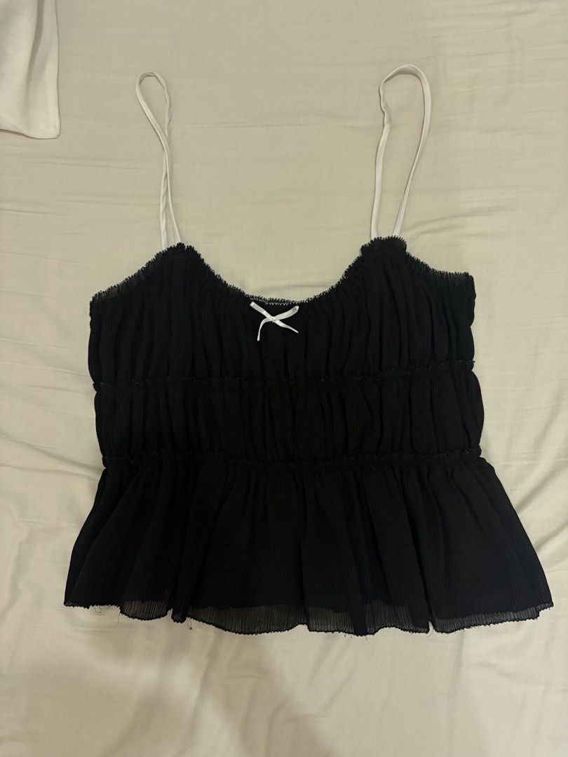 Black zara top (Category: Sleeveless) located in Mandaluyong City. Submitted by beas_closet (Listing ID 1469296751, Image 1). Description: S on tag can fit m Stretchable .