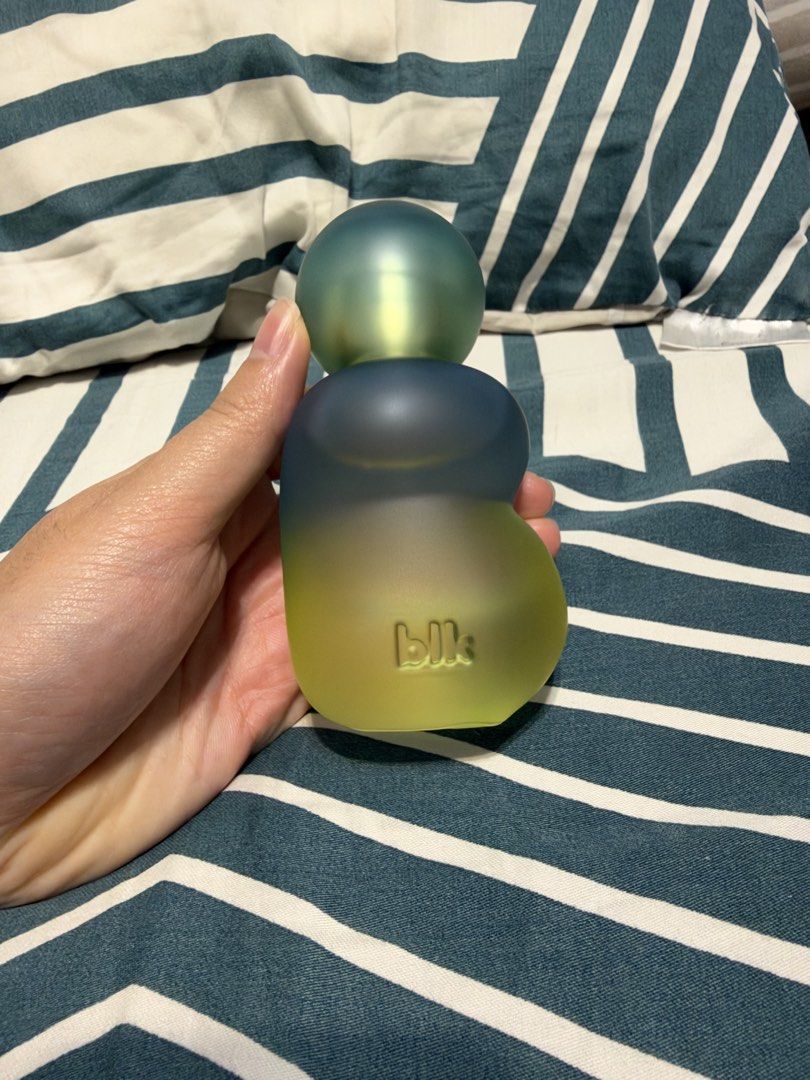 blk Cosmetics Fragrance Mist Perfume (Category: Fragrance & Deodorants) located in Manila. Submitted by garagesalebykoda (Listing ID 1469164606, Image 1). Description: - Authentic blk cosmetics perfume bottle - Unique asymmetrical glass design with a frosted green, blue, and yellow gradient - Compact and easy-to-hold size - Features a minimalist embossed blk logo on the lower front - Fun and quirky vanity decor piece.
