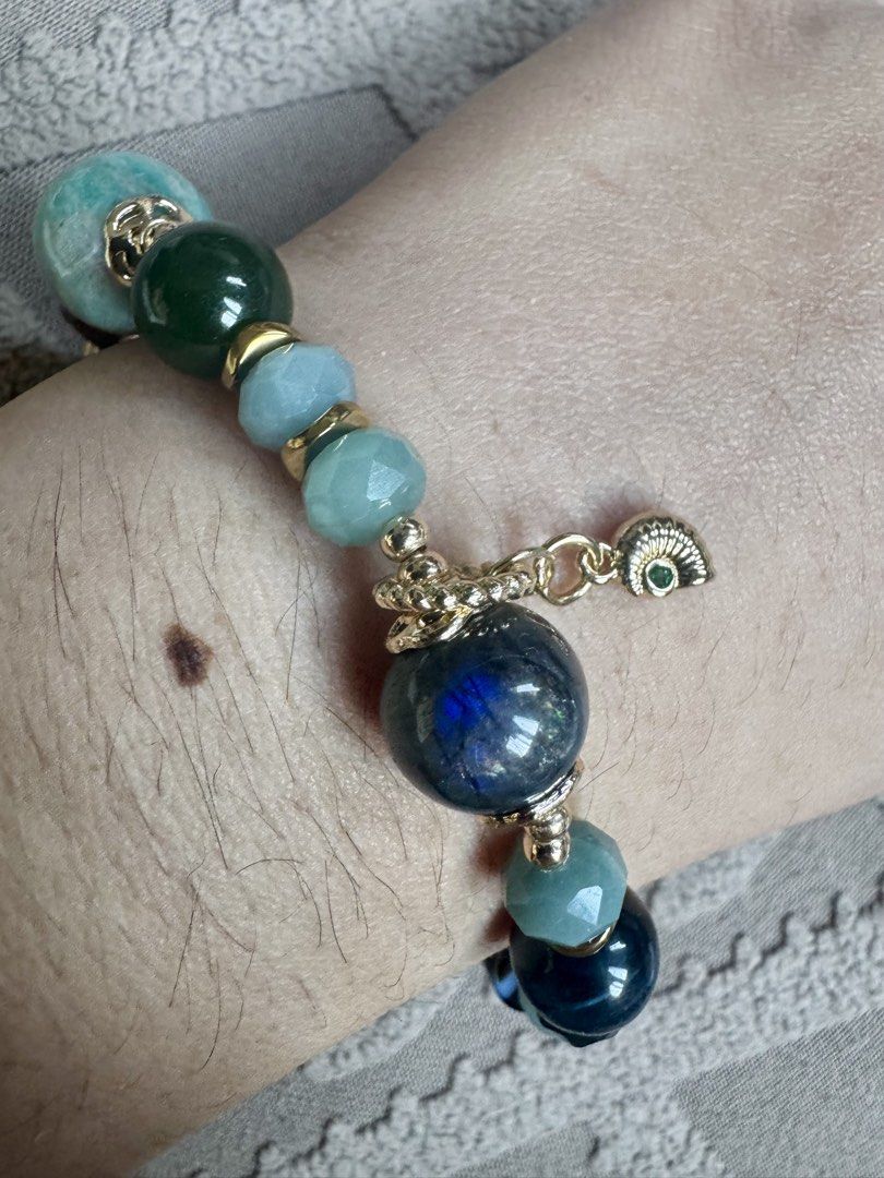 Blue water jadeite, labradorite and amazonite bracelet (Category: Bracelets) located in Quezon City. Submitted by nics006 (Listing ID 1469393225, Image 3). Description: 💙✨ DOUBLE THE TREASURES, DOUBLE THE BLESSINGS! ✨💚 Attract good fortune, embrace positive energy, and elevate your everyday style with this stunning Duo Bao Bracelet! A beautiful combination of Labradorite, Amazonite, Blue Water Jadeite, Green Rutilated beads, and Hematite — thou