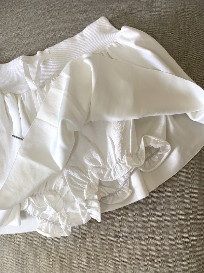 Bnew White mini skirt (Category: Skirts) located in Paranaque City. Submitted by shoplovedbya (Listing ID 1469201519, Image 3). Description: ♡ Waist: 25-31 ♡ Hips: up to 38 ♡ Length: 11.5 - New, with inner shorts.