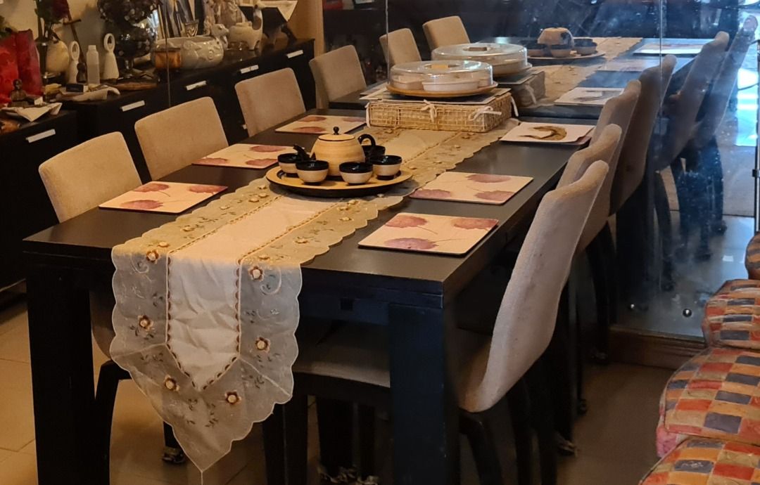 Bo Concept Dark Wood Dining Table with Upholstered Chairs Set (Category: Tables & Sets) located in Taguig. Submitted by maritoni_g (Listing ID 1469195852, Image 3). Description: - Bo Concept Modern Black Dark Wood Dining Set - Includes 1 Dining Table extandable on both sides and 8 upholstered beige fabric and wood chairs - Elegant dark wood finish rectangular dining table - Matching chairs with comfortable padded beige fabric seats and high backs