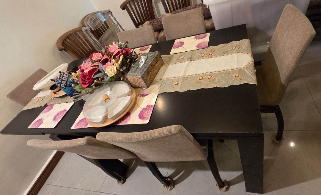 Bo Concept Dark Wood Dining Table with Upholstered Chairs Set (Category: Tables & Sets) located in Taguig. Submitted by maritoni_g (Listing ID 1469195852, Image 1). Description: - Bo Concept Modern Black Dark Wood Dining Set - Includes 1 Dining Table extandable on both sides and 8 upholstered beige fabric and wood chairs - Elegant dark wood finish rectangular dining table - Matching chairs with comfortable padded beige fabric seats and high backs