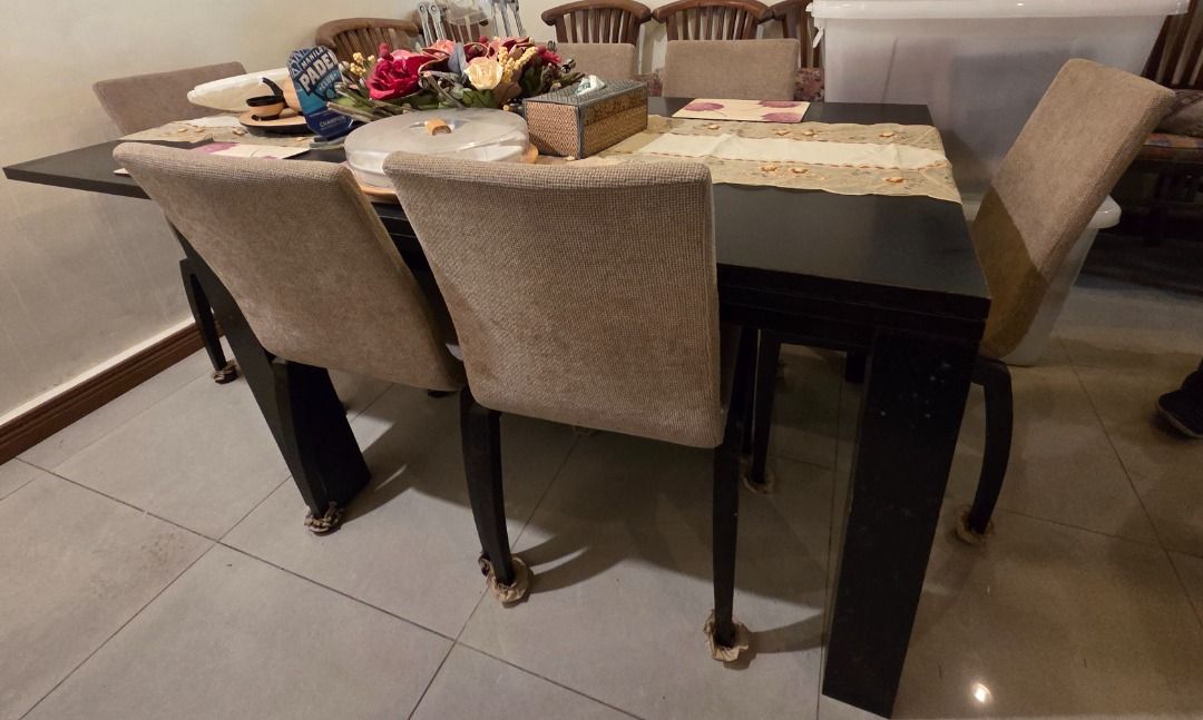 Bo Concept Dark Wood Dining Table with Upholstered Chairs Set (Category: Tables & Sets) located in Taguig. Submitted by maritoni_g (Listing ID 1469195852, Image 2). Description: - Bo Concept Modern Black Dark Wood Dining Set - Includes 1 Dining Table extandable on both sides and 8 upholstered beige fabric and wood chairs - Elegant dark wood finish rectangular dining table - Matching chairs with comfortable padded beige fabric seats and high backs