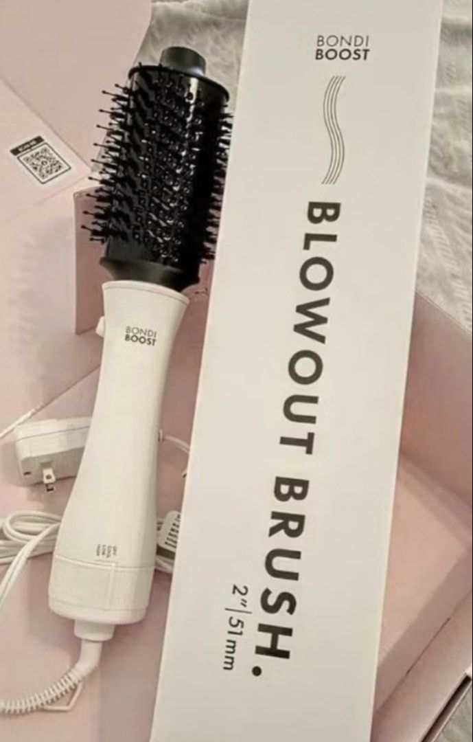 Bondi Boost Blowout Brush 2 inch (Category: Hair) located in Manila. Submitted by lxi16 (Listing ID 1469168588, Image 1). Description: - Brand: Bondi Boost 2-inch Blowout Brush - Color: Classic White & Black - Detachable head design for quick and easy root drying - Perfect for achieving a sleek finish with gorgeous loose waves - Ideal for shorter hair lengths - Includes original box in packaging - Guaranteed authentic and well-maintained - Bought