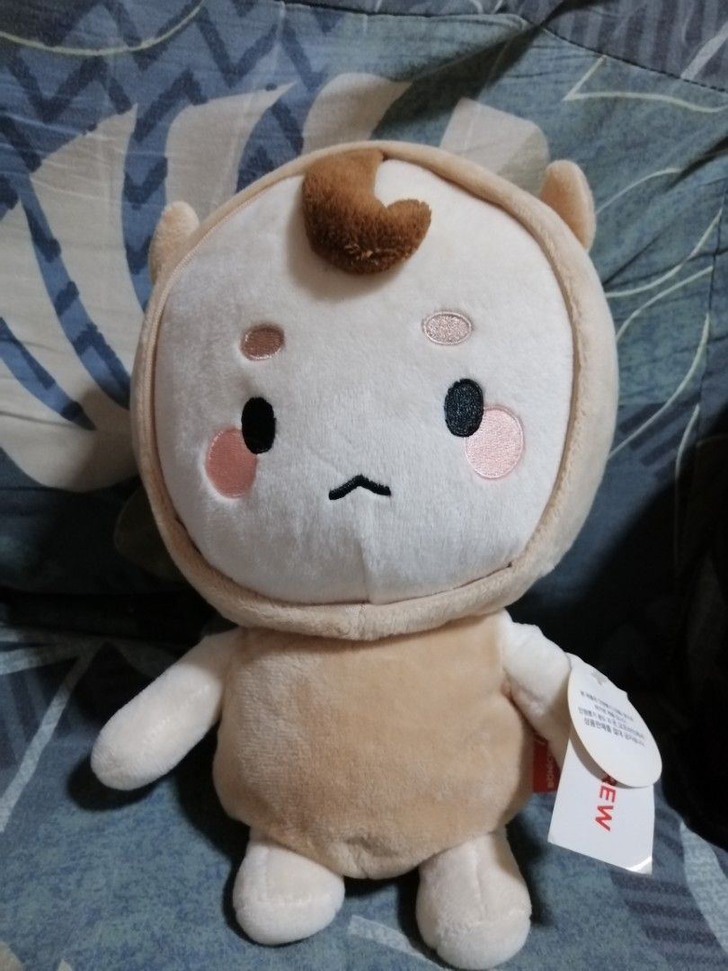 BoniCrew Plush Toy Set (Category: Plushies & Soft Toys) located in Angono. Submitted by rlinee_93 (Listing ID 1469213574, Image 2). Description: Two plushies from BoniCrew. One light brown character wearing a hooded outfit with pink cheeks and a small brown curl on top. Second character dressed in a black ninja or superhero costume with a mask, sleepy eyes, and a winged logo on the chest. Both have original tags attached. Soft fabric, clean condi