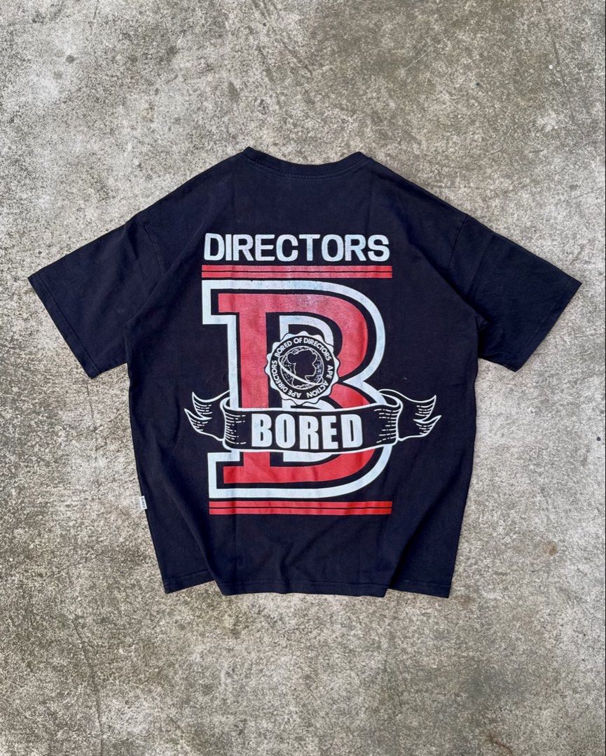Bored of Directors Graphic Tee (Category: Tshirts & Polo Shirts ) located in Kalibo. Submitted by handmedownsklb (Listing ID 1469283055, Image 1). Description: Size: L on tag Width 23” Length 28” Color Rate:10 /10 Good Condition, print cracks .