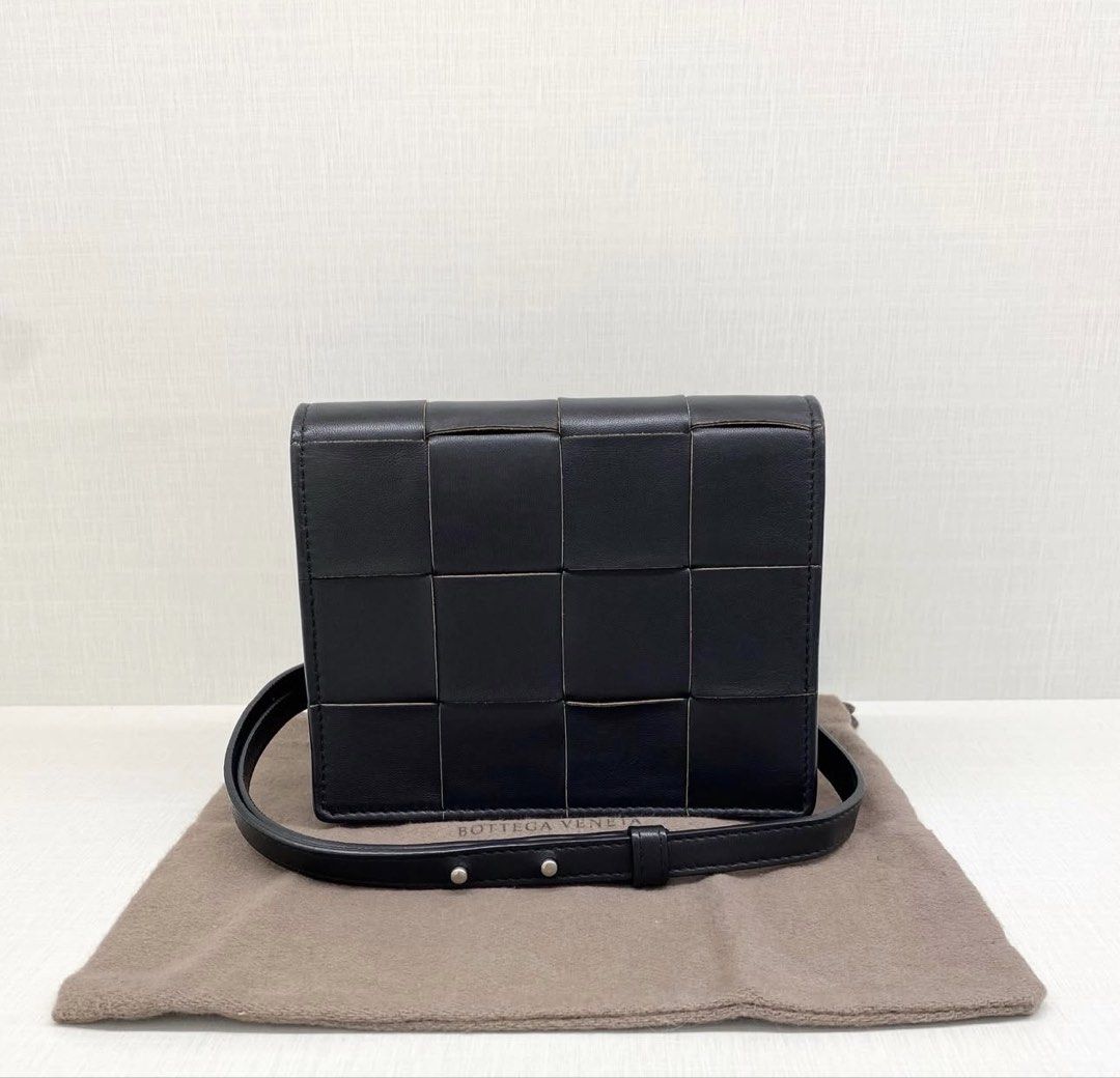 BOTTEGA VENETA mini cassette black (Category: Luxury Bags & Wallets) located in Tagaytay City. Submitted by eg_gallery (Listing ID 1469393021, Image 1). Description: guaranteed authentic / dustbag, strap.