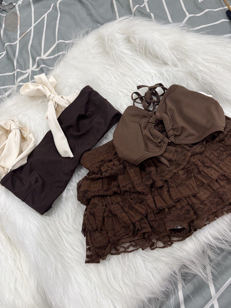 Brown Bikini Set (Category: Bikinis & Swimsuits) located in Las Pinas. Submitted by juls_mp (Listing ID 1469330507, Image 1). Description: 3 piece bikini set (h&m top) Issue: No padding .
