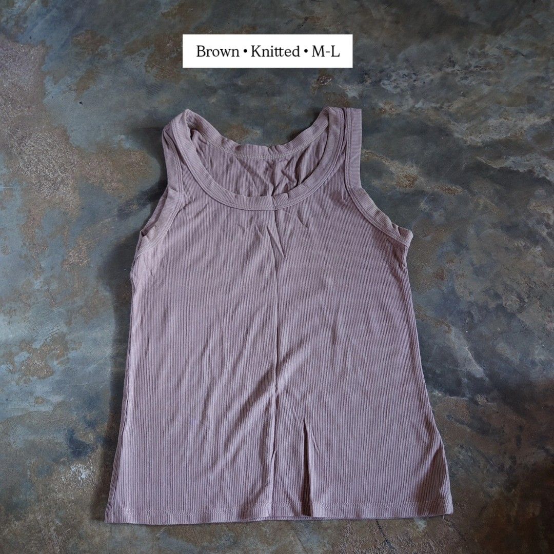 Brown Knitted Tank Top M-L (Category: Sleeveless) located in Diffun. Submitted by declutteredbyJill (Listing ID 1469238020, Image 1). Description: - Color: Brown - Material: Stretchy ribbed knit - Size: M to L - Design: Scoop neckline on front and back - Fit: Comfy and versatile for daily wear - Easy to match with any wardrobe outfit.