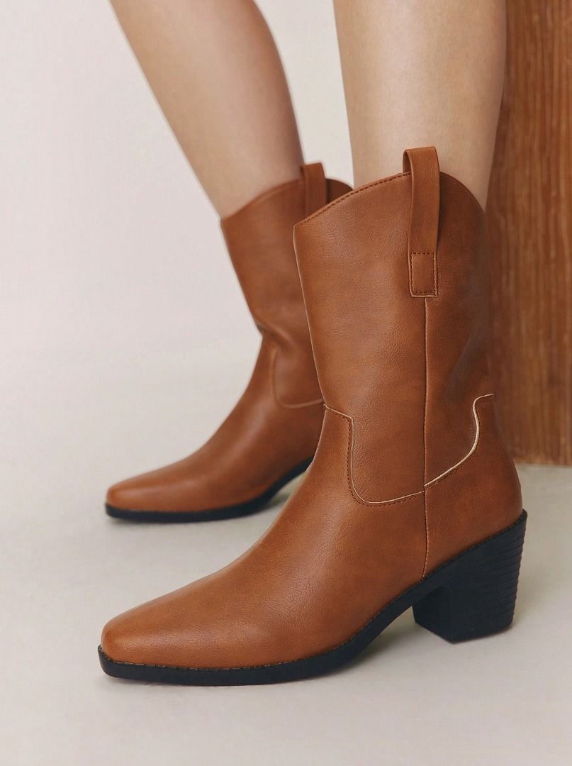 Brown Mid-Calf Cowboy Boots (Category: Boots) located in Pasig City. Submitted by milliesattic (Listing ID 1469199947, Image 2). Description: - Size EUR39 on the website - I'm a size 8 US (24.5 CM) - Western/cowboy style mid-calf boots - Used only once for an event - Very good and like-new condition.