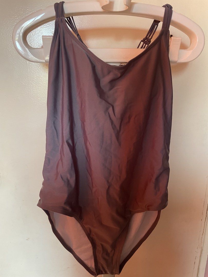 Brown One-Piece Swimsuit with Macrame Back Detail (Category: Bikinis & Swimsuits) located in Manila. Submitted by zzjjm (Listing ID 1469215939, Image 1). Description: - Color: gray - Design: Deep scoop front and low scoop back - Details: Intricate macrame strap detailing on the back - Support: Built-in shelf bra padding - Material: Smooth, comfortable fabric.