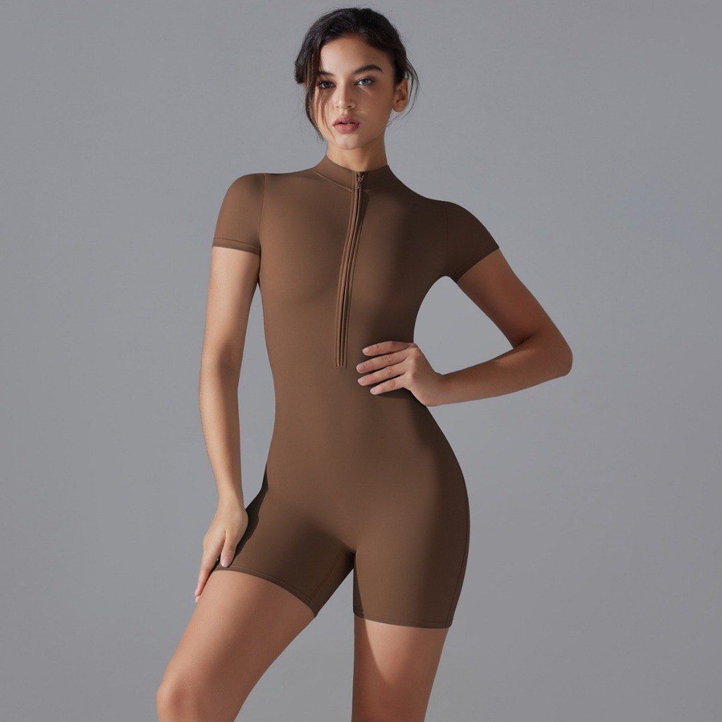 Brown Short Sleeve Zip Front Workout Romper Jumpsuit (Category: Jumpsuits) located in Siquijor. Submitted by yhostuff (Listing ID 1469320294, Image 1). Description: - Brown short sleeve bodycon romper - Front zip closure and biker shorts - Size on tag: XL -Best fit: Large to Semi XL - Material: 90% polyester, 10% spandex - Care: Machine wash at 30°C, do not bleach, tumble dry, or dry clean - Condition: Clean fabric and solid construction 📌Used o