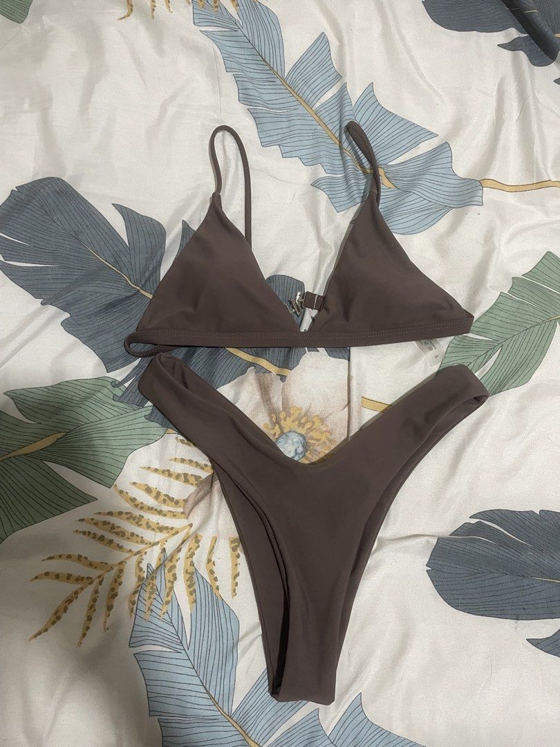 Brown Triangle Bikini Two Piece Swimsuit (Category: Bikinis & Swimsuits) located in Taytay. Submitted by sandgraffiti (Listing ID 1469317096, Image 3). Description: triangle top with thin straps and V-cut high-waisted bottoms worn only once cleaned , washed actual ww posted padded.