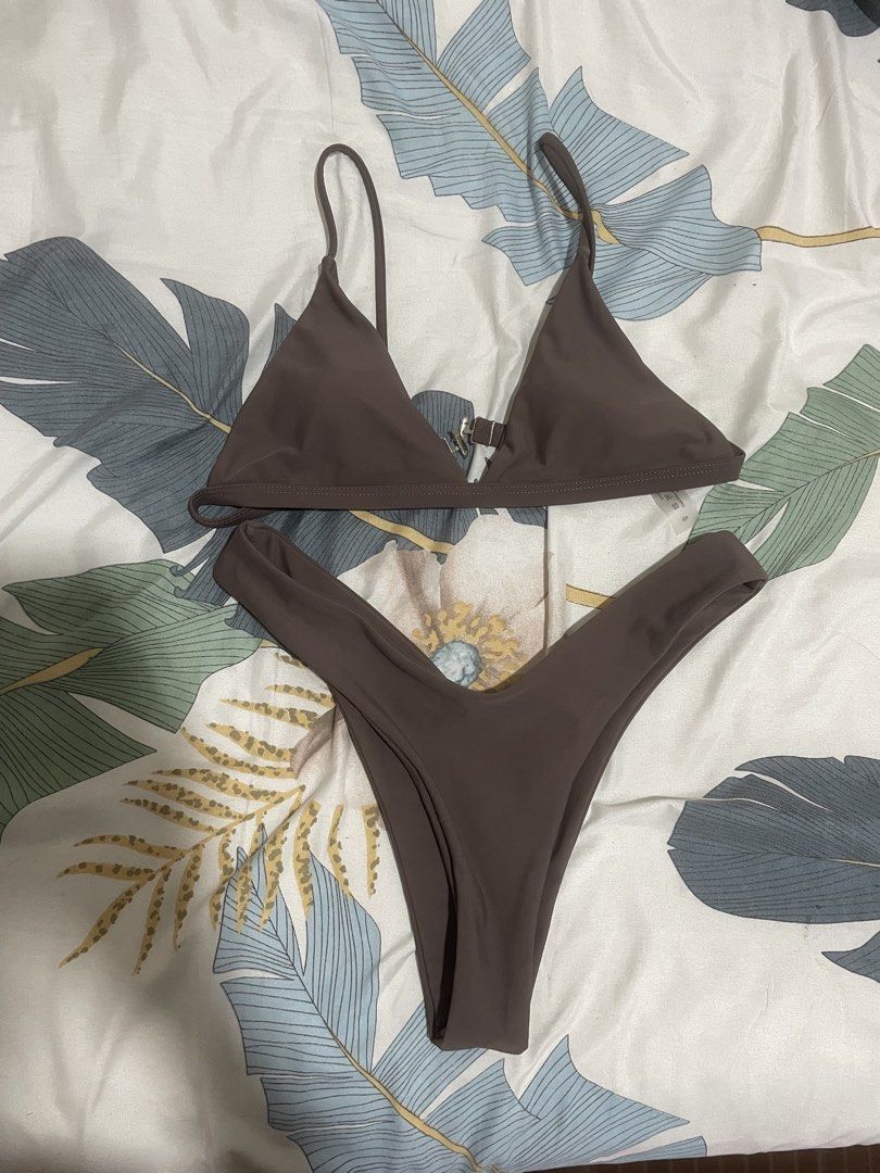 Brown Triangle Bikini Two Piece Swimsuit (Category: Bikinis & Swimsuits) located in Taytay. Submitted by sandgraffiti (Listing ID 1469317096, Image 2). Description: triangle top with thin straps and V-cut high-waisted bottoms worn only once cleaned , washed actual ww posted padded.