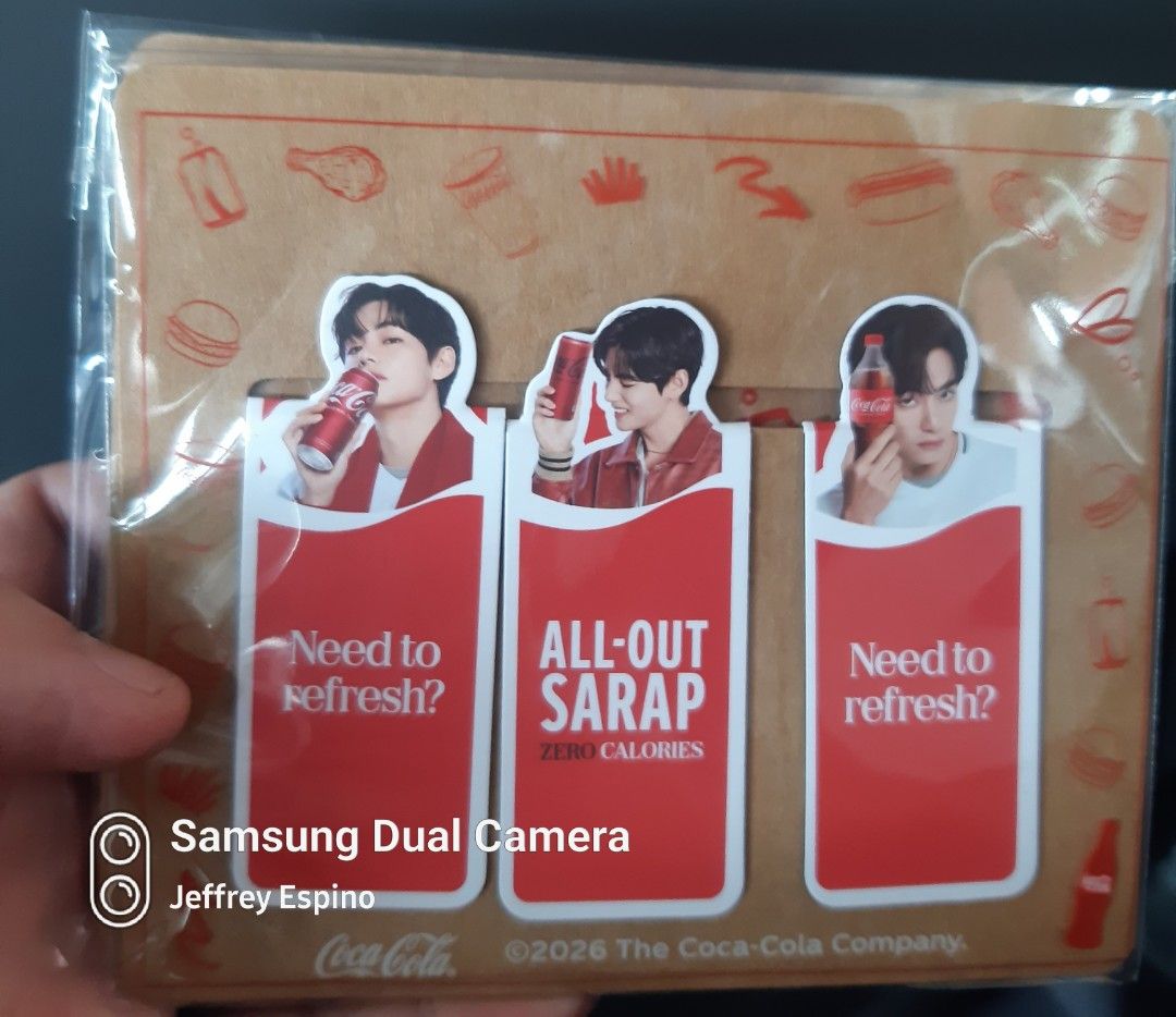 BTS Coca-Cola Magnetic Bookmark Set Official Merch (Category: Other Merchandise) located in Quezon City. Submitted by jeffreyespino (Listing ID 1469392846, Image 1). Description: - Set of 3 authentic Coca-Cola magnetic bookmarks featuring BTS member - Iconic red and white design with special slogans ('Need to Refresh', 'All-Out Sarap') - Brand new and unopened - Still sealed in original plastic packaging with cardboard backing - Perfect for ARMYs