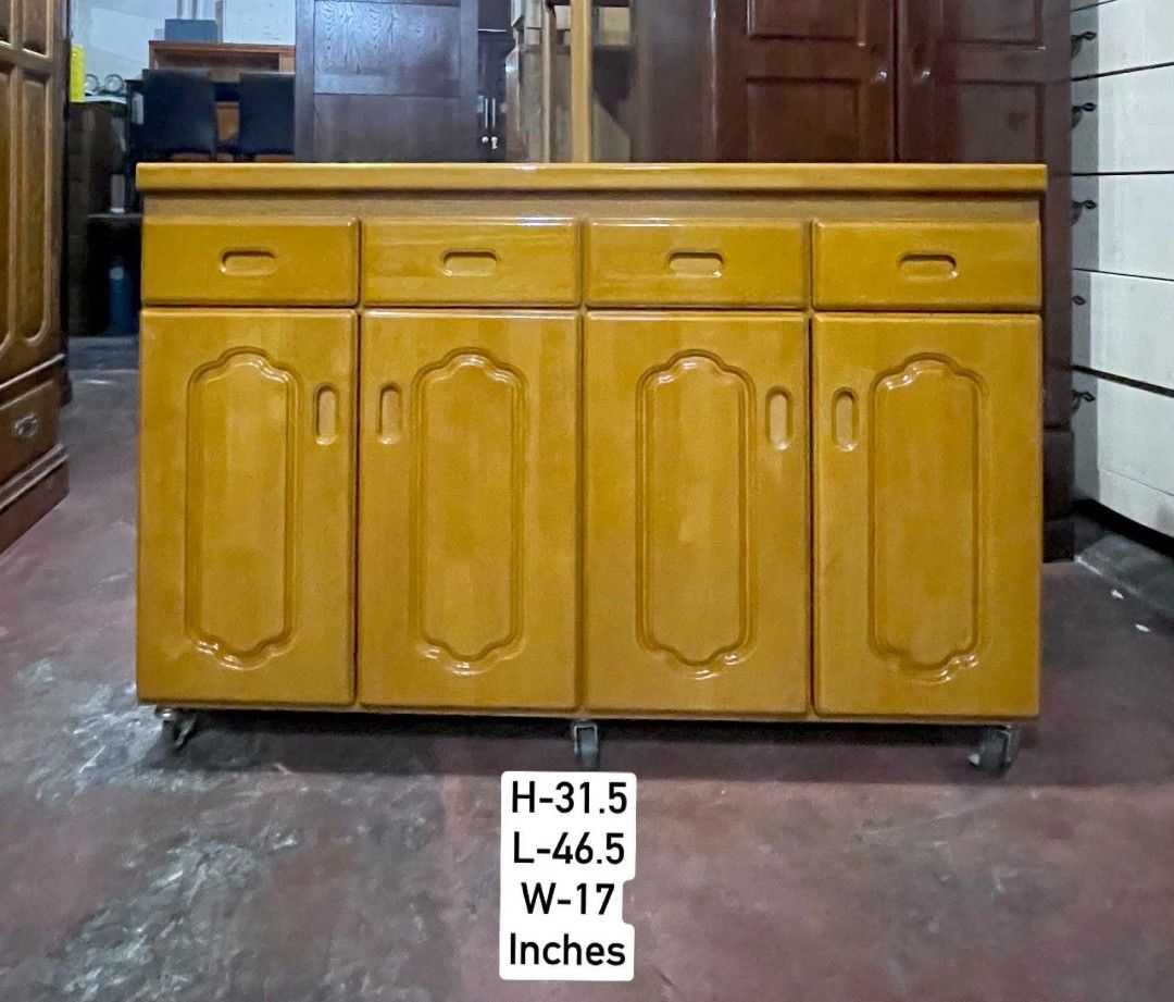 Buffet Sideboard Console Cabinet (Category: Shelves, Cabinets & Racks) located in Quezon City. Submitted by dannikkishoppe2 (Listing ID 1469215062, Image 2). Description: Buffet Sideboard Console Cabinet ‼️₱7800‼️ ✅ 4 Door Cabinets ✅ 4 Upper Drawers ✅ With Caster Wheels for Easy Moving ✅ Sturdy and Functional Design ✅ Perfect for Home, Office, or Business 📏 Dimensions: H 31.5 L 46.5 W 17 inches Please manage your expectations as there might be m