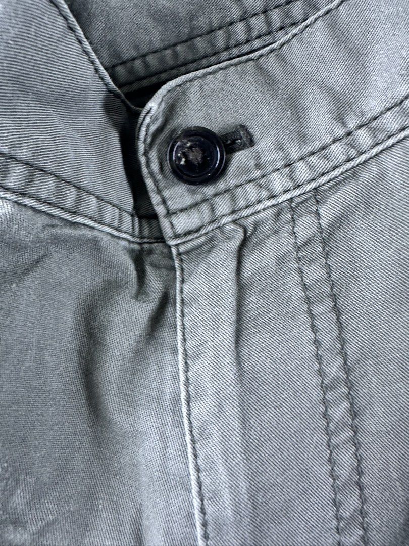 Burberry Black Label Cargo Pants Green (Category: Joggers) located in Manila. Submitted by declutterpromax (Listing ID 1469223228, Image 2). Description: - Brand: Burberry Black Label - Color: Olive Green - Fit: Straight leg - Material: Sturdy twill fabric - Features: Multiple utility pockets with button and zip closures, rear buttoned pockets, and branded hardware zipper pulls - Condition: Excellent pre-owned condition (Ready to wear) - Mode of 