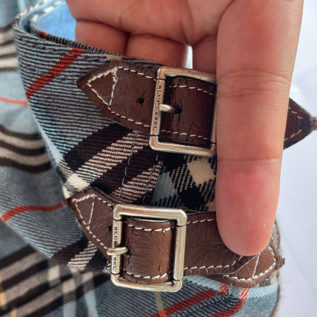 Burberry blue label skirt (Category: Skirts) located in Malabang. Submitted by moneyfckyaw (Listing ID 1469328408, Image 2). Description: Good condition .