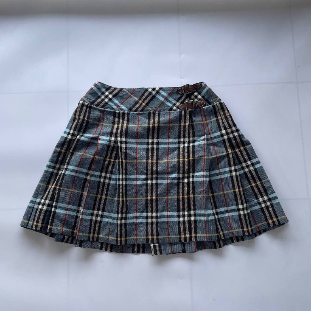 Burberry blue label skirt (Category: Skirts) located in Malabang. Submitted by moneyfckyaw (Listing ID 1469328408, Image 1). Description: Good condition .