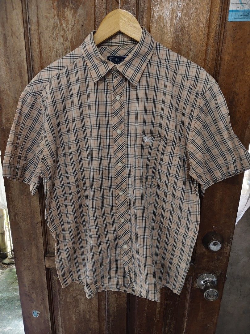 Burberry Plain Button Down Polo shirt (Category: Tshirts & Polo Shirts ) located in Iloilo. Submitted by branded-boy0422_16 (Listing ID 1469207227, Image 1). Description: Fits Large To Xl W: 22 L: 29 Excellent to as new need washed only.