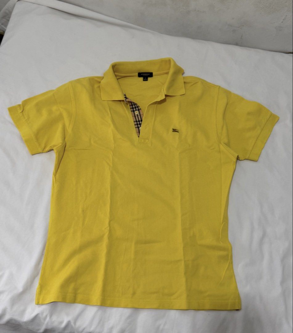 Burberry Polo (Category: Tshirts & Polo Shirts ) located in Bulacan. Submitted by block.by.ep (Listing ID 1469307482, Image 2). Description: Burberry Polo -Bright yellow -L tags 22.5x26 curated .