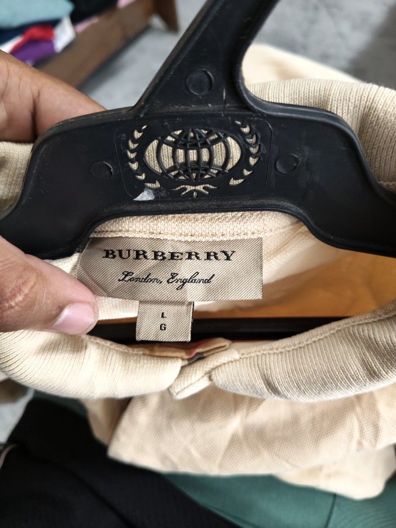 Burberry Polo T-Shirt (Category: Tshirts & Polo Shirts ) located in Cabadbaran. Submitted by jem1124 (Listing ID 1469220502, Image 3). Description: 21.5x 28 excellent condition issue: stain (washable) see last image.