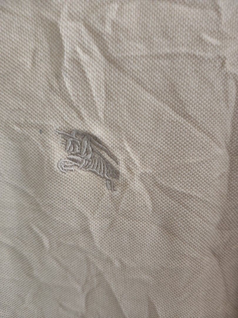 Burberry Polo T-Shirt (Category: Tshirts & Polo Shirts ) located in Cabadbaran. Submitted by jem1124 (Listing ID 1469220502, Image 2). Description: 21.5x 28 excellent condition issue: stain (washable) see last image.