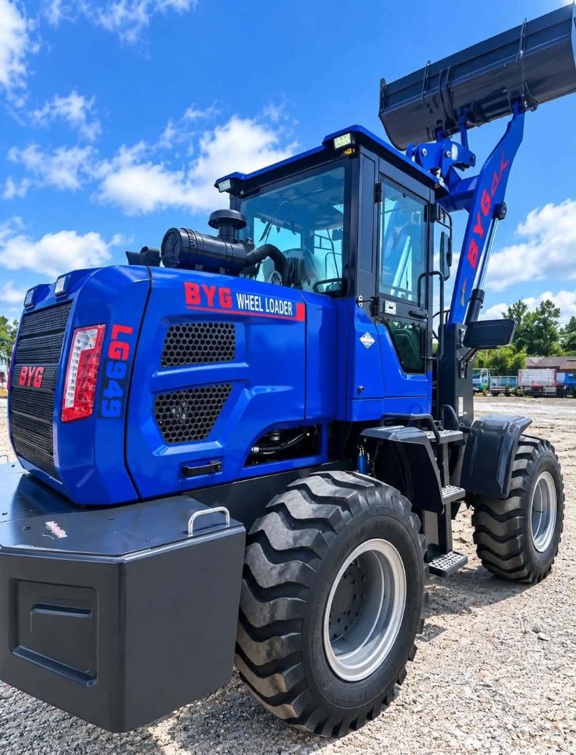 BYG LG949 Wheel Loader Heavy Equipment (Category: Industrial Equipment) located in Caloocan City. Submitted by princess1210_ (Listing ID 1469229270, Image 2). Description: - Model: BYG LG949 Wheel Loader - Color: Vibrant Blue - Condition: Clean body panels with clear branding - Features: Enclosed operator cabin, heavy tread tires, and rear counterweight - Performance: Powerful hydraulic arms with elevated front bucket - Application: Ideal for hea
