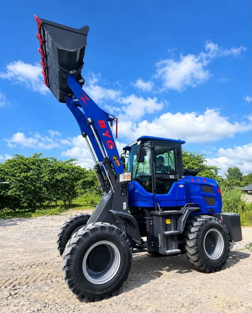 BYG LG949 Wheel Loader Heavy Equipment (Category: Industrial Equipment) located in Caloocan City. Submitted by princess1210_ (Listing ID 1469229270, Image 1). Description: - Model: BYG LG949 Wheel Loader - Color: Vibrant Blue - Condition: Clean body panels with clear branding - Features: Enclosed operator cabin, heavy tread tires, and rear counterweight - Performance: Powerful hydraulic arms with elevated front bucket - Application: Ideal for hea