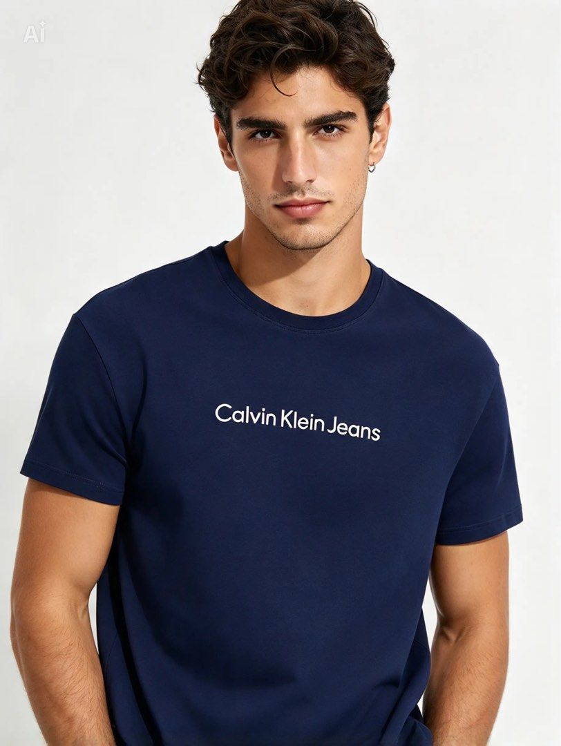 CALVIN KLEIN (Category: Tshirts & Polo Shirts ) located in Davao. Submitted by sart0ria85 (Listing ID 1469313574, Image 2). Description: Navy Blue with White logo on a Soft cotton jersey. Label details are vague. XLARGE. Size 10 GOOD CONDITION (84/100).