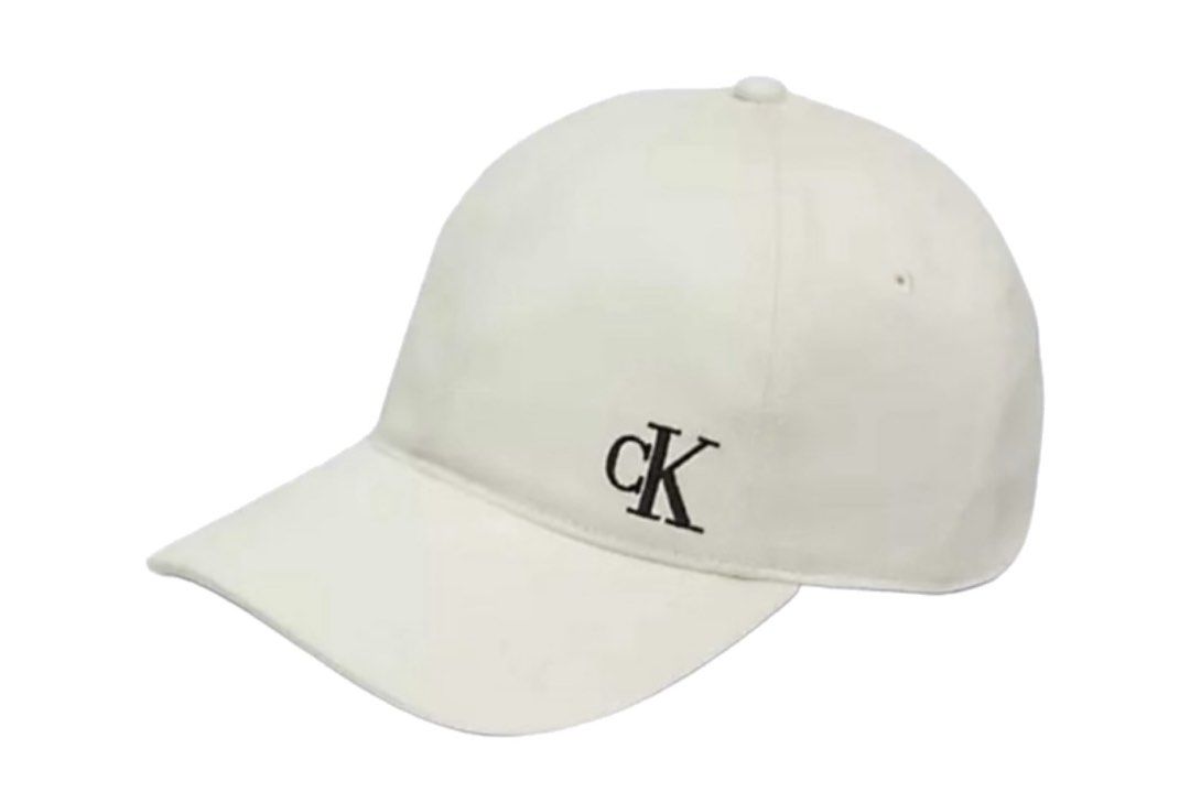 Calvin Klein Baseball Cap (Category: Caps & Hats) located in Makati City. Submitted by clutterfreejia (Listing ID 1469224879, Image 1). Description: Store bought at ₱1600 Color: cream / light beige Needs cleaning / wash No flaws other than the stains due to storage Rfs: decluttering.