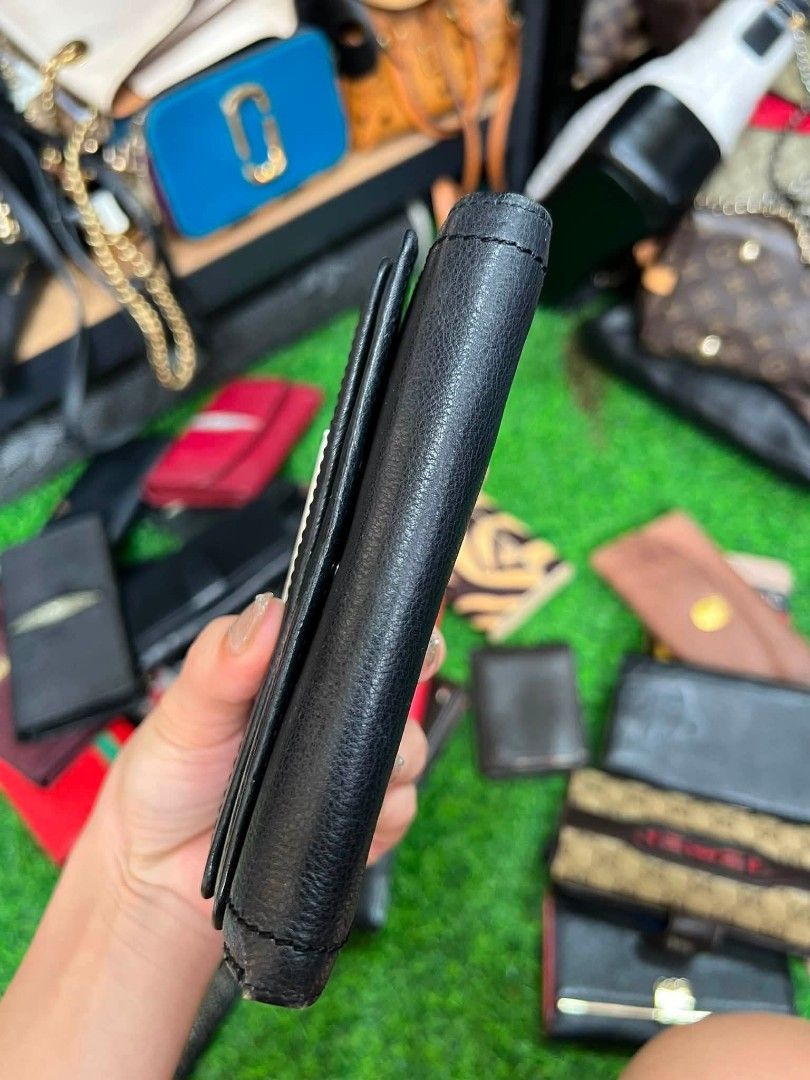 Calvin Klein Black leather wallet (Category: Luxury Bags & Wallets) located in Sorsogon. Submitted by ukay_finds9.9 (Listing ID 1469271290, Image 2). Description: Open for counter offer.