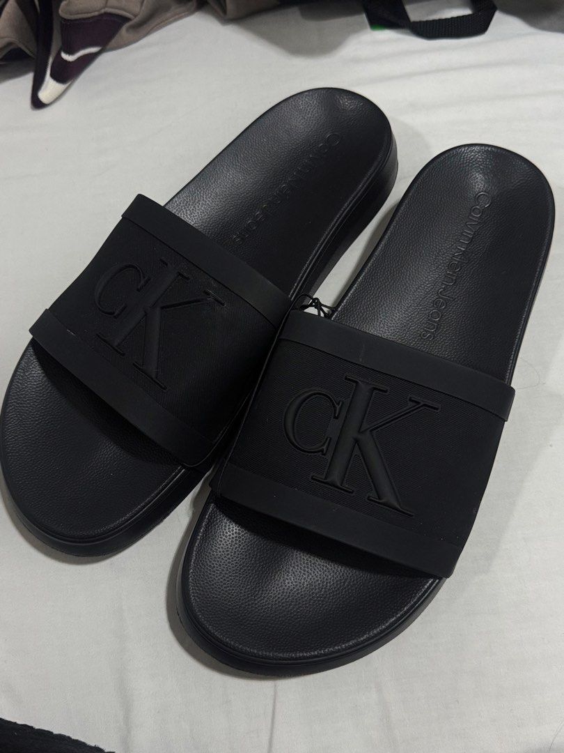Calvin Klein Black Slides (Category: Slippers & Slides) located in Manila. Submitted by shaineee (Listing ID 1469300057, Image 1). Description: - brand new - 9 mens.