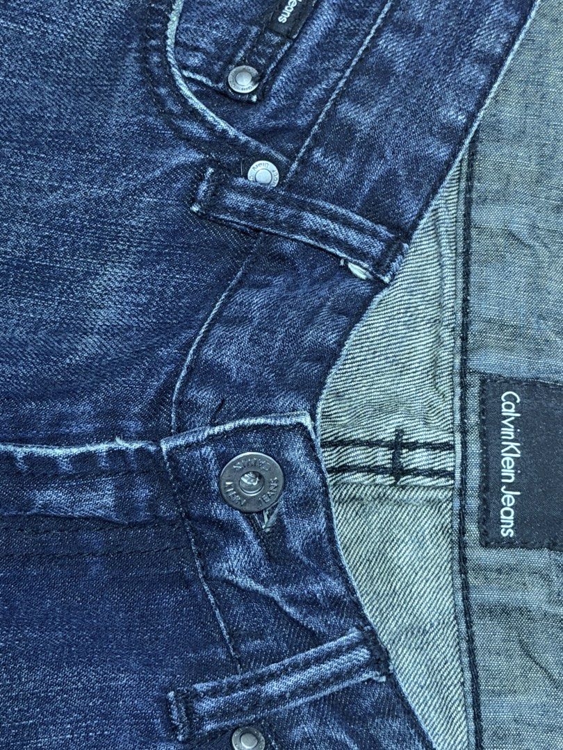 Calvin Klein Indigo Blue Flared Bootcut Jeans (Category: Jeans) located in Caloocan City. Submitted by __archived (Listing ID 1469275805, Image 2). Description: Stunning wash | Hard Denim waist: 30” length: 40” leg opening: 10”.