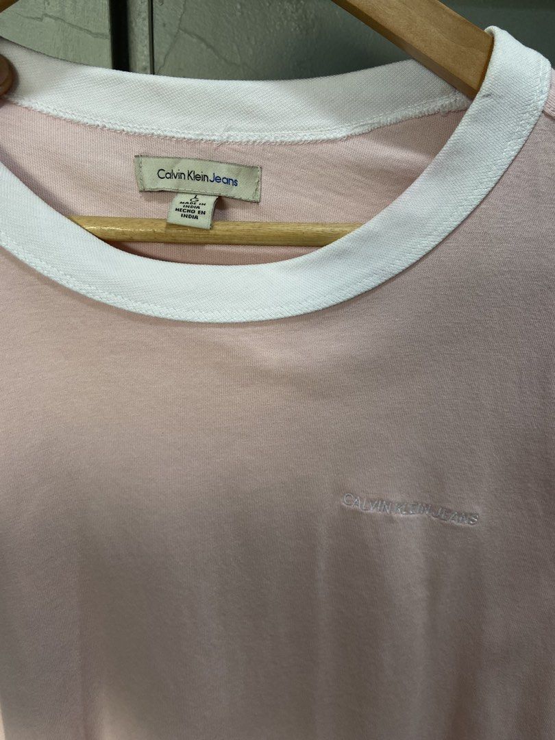 Calvin Klein Ringer Shirt (Category: Tshirts & Polo Shirts ) located in Panabo. Submitted by thrifty.red (Listing ID 1469298864, Image 2). Description: width:20 length:27 Excellent Condition.