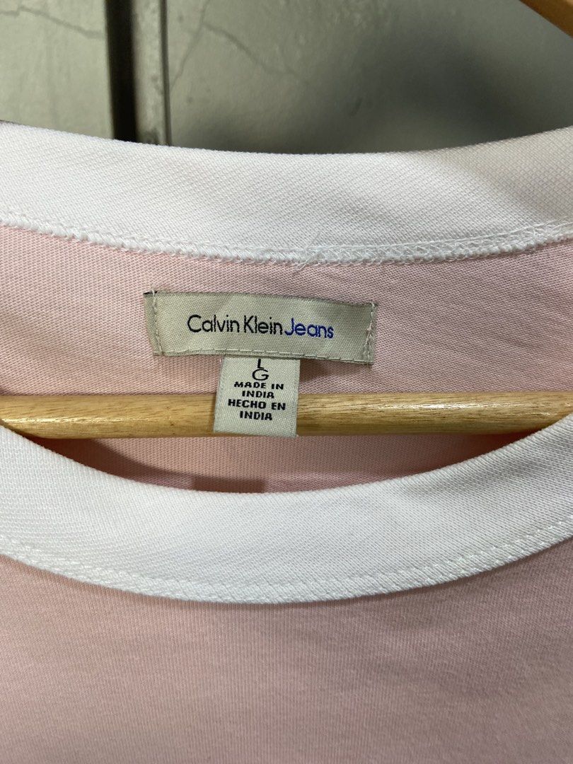 Calvin Klein Ringer Shirt (Category: Tshirts & Polo Shirts ) located in Panabo. Submitted by thrifty.red (Listing ID 1469298864, Image 3). Description: width:20 length:27 Excellent Condition.