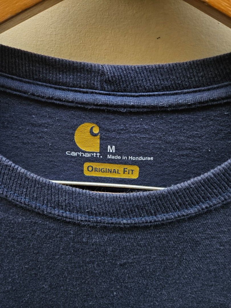 CARHARTT K87 Navy Blue Pocket Tee-Size Medium (Category: Tshirts & Polo Shirts ) located in San Pablo. Submitted by pablo_pablo25 (Listing ID 1469226395, Image 3). Description: 22.5x30 dime good condi 1 repaired pinhole hindi na pansin.