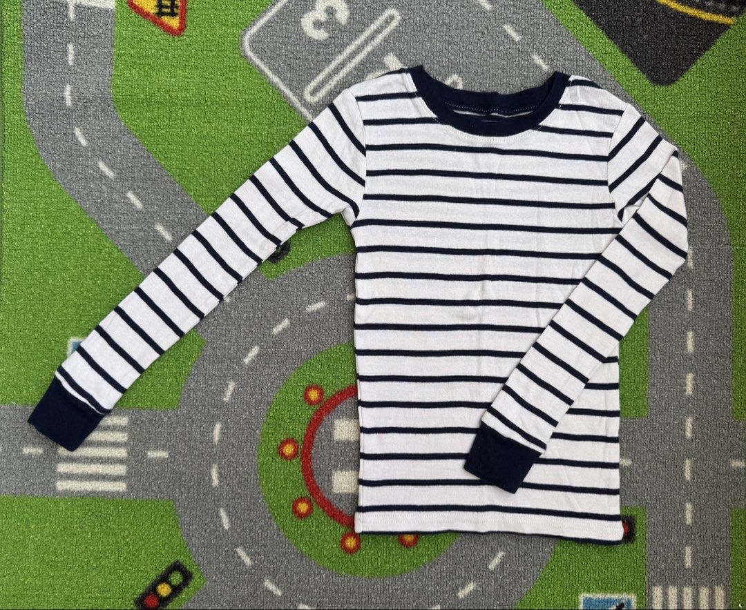 Carter’s Striped Long Sleeve Shirt (Category: Babies & Kids Fashion) located in Rizal. Submitted by preloovved (Listing ID 1469175829, Image 1). Description: Navy and white striped long sleeve top in a ribbed knit. Features dark blue cuffs and collar. Perfect layering basic for cooler weather. Clean and well-maintained condition. Preloved, 6yo, stretchy Meet-up only in GB1 San Mateo, Rizal Shipping fee c/o buyer. Tres Marias or J&T express Paymen