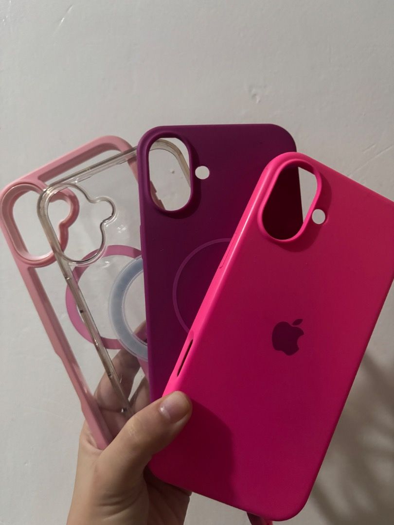 Case for iPhone 16 Plus (Category: Cases & Sleeves) located in Taguig. Submitted by vashtardo (Listing ID 1469210999, Image 1). Description: - Compatible Model: iPhone 16 Plus - Material: Premium smooth silicone with soft microfiber interior lining - Features: Vibrant color options (pink, purple, clear), MagSafe ring design, and matching wrist strap for secure carrying - Condition: Used and in good condition - Protection: Full coverage protection